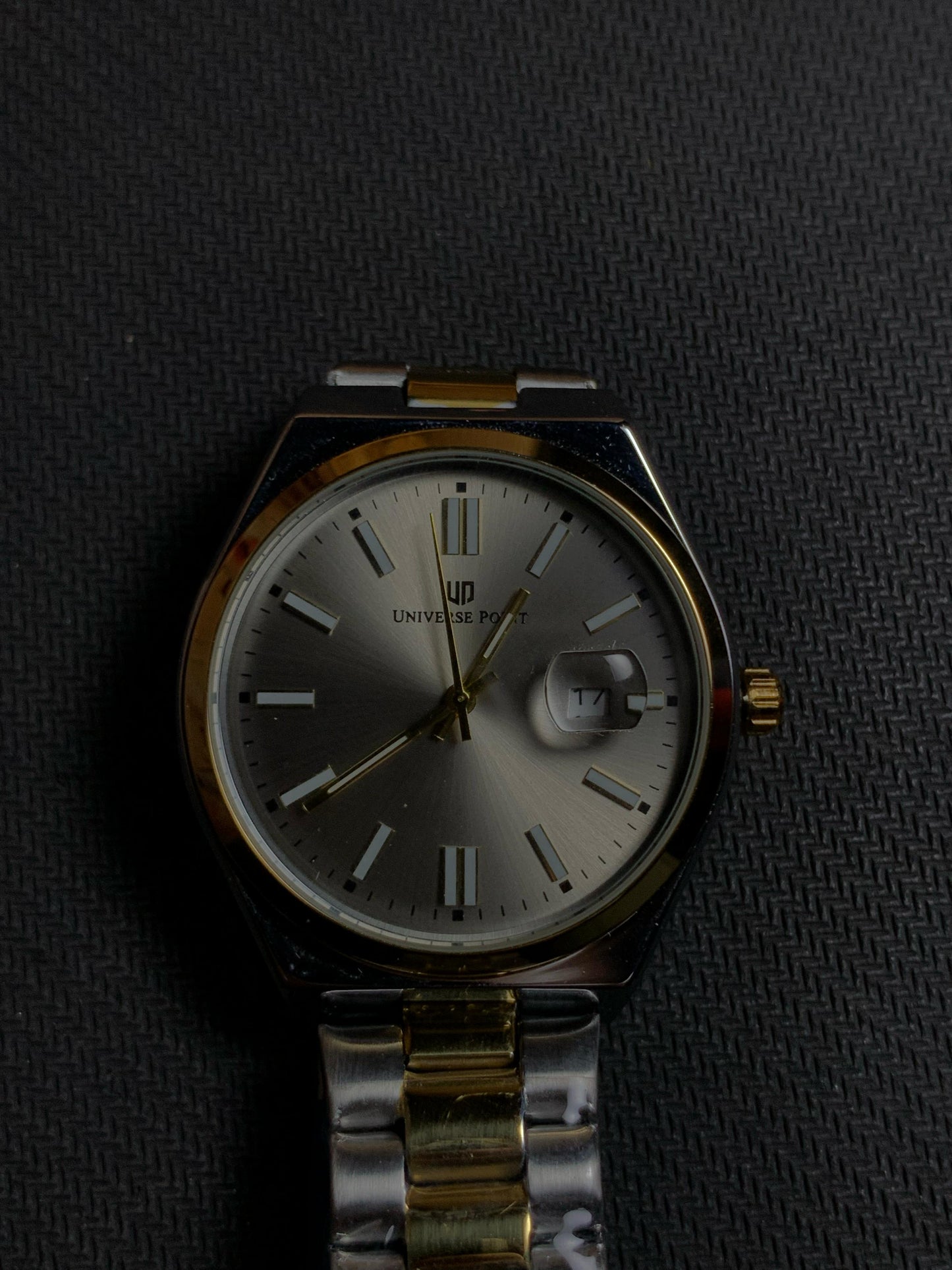 Universe Luxury Silver Grey Watch With Gold Silver Straps And Neon Hours.