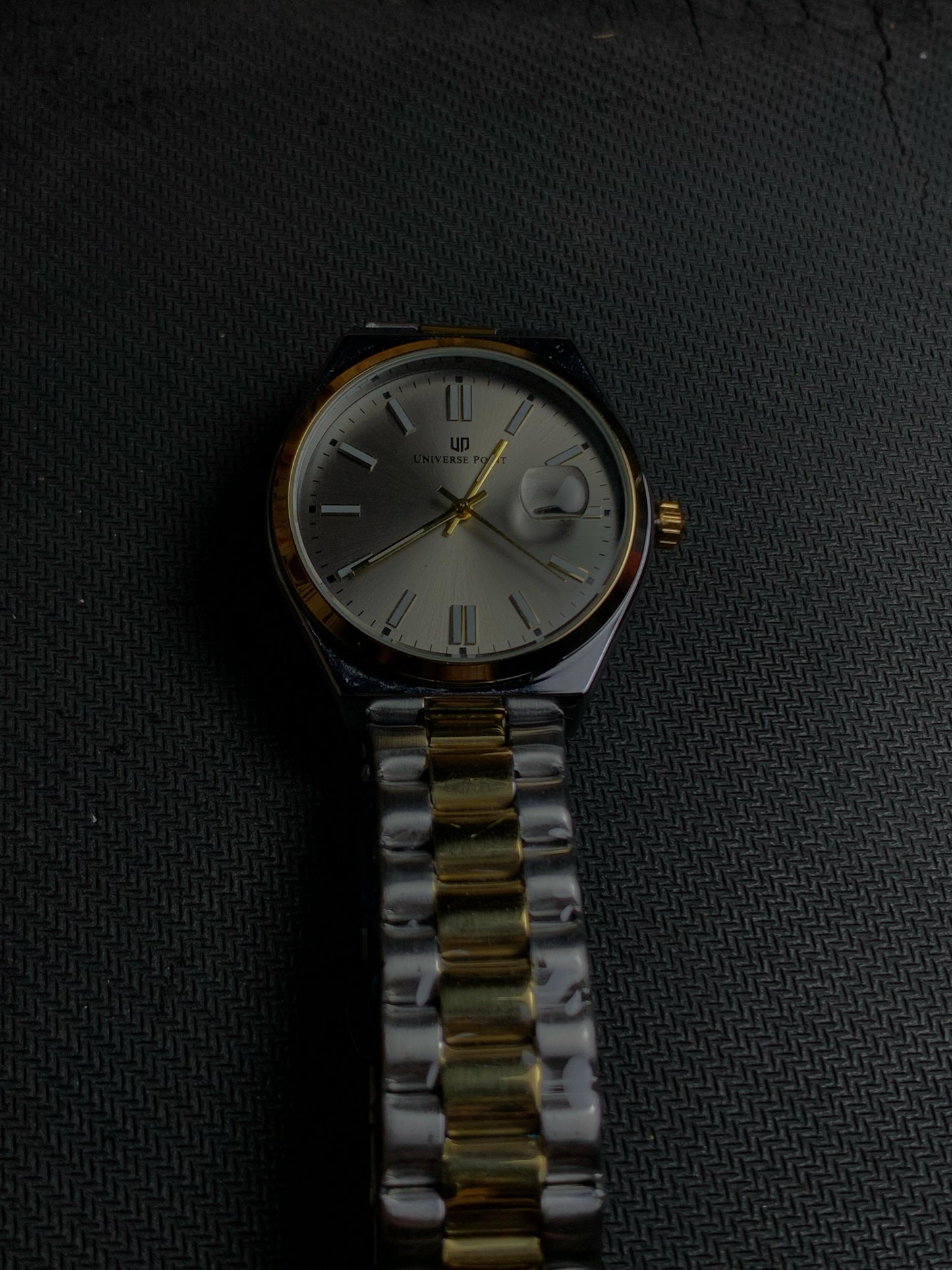 Universe Luxury Silver Grey Watch With Gold Silver Straps And Neon Hours.